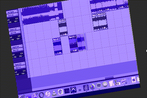 Now The screen tilts to the left, its color tin rapidly shifts as the camera slides around with the mouse as it duplicates, drags, and drops audio chunks around across four tracks as they fall into place on the mix window's gridded lines.